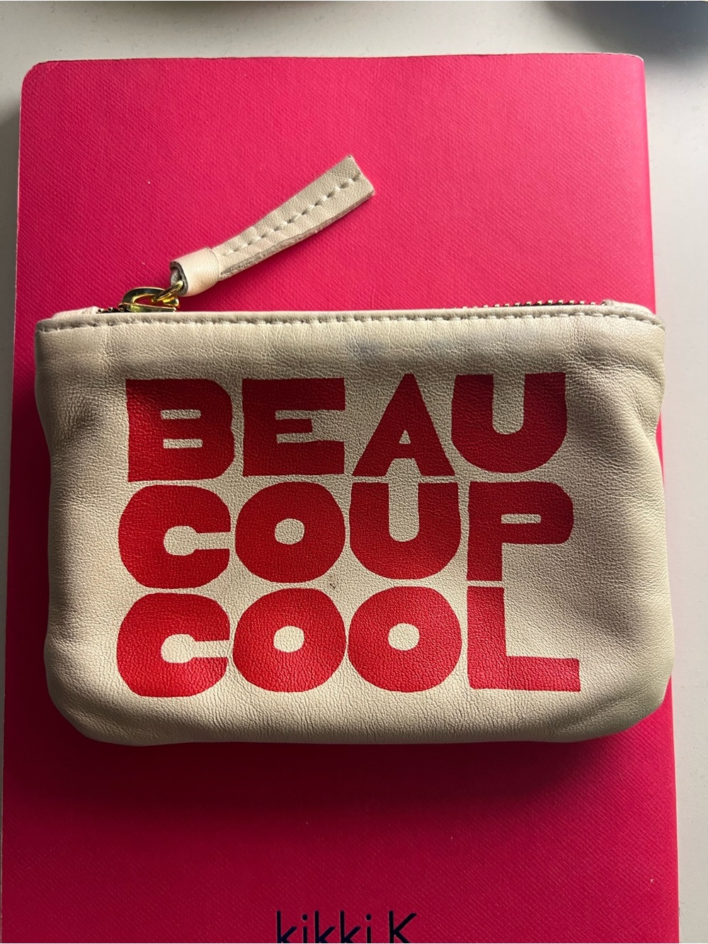 Beige Leather Coin Pouch with Red 'BEAU COUP COOL' Graphic